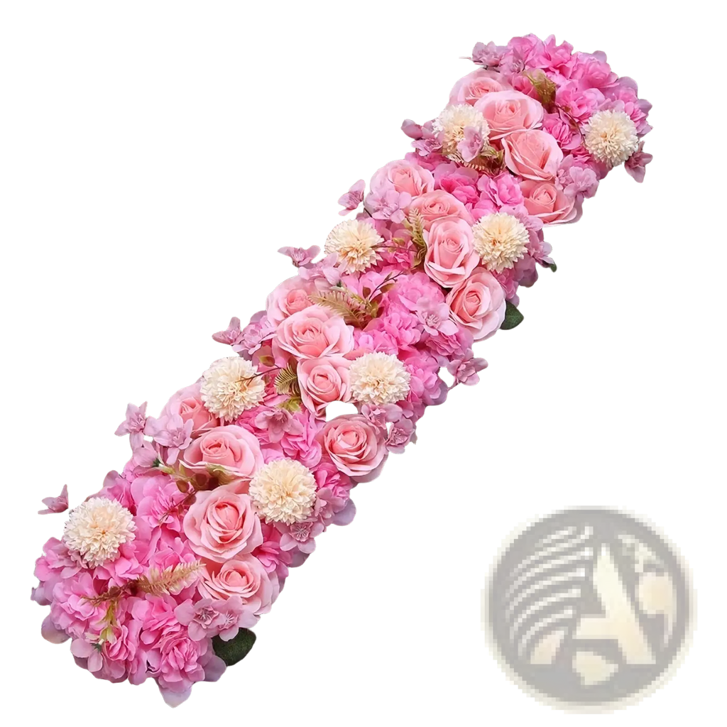 White rose wedding ground flower arrangement with pink roses hydrangeas and cream pom-poms in a diagonal garland