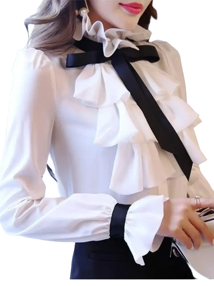 White ruffled long sleeve blouse with black satin ribbon bow at neckline and matching cuff ties made of lightweight fabric
