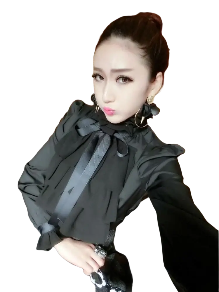 Black long sleeve ruffled blouse with a prominent bow at the neckline made of lightweight fabric
