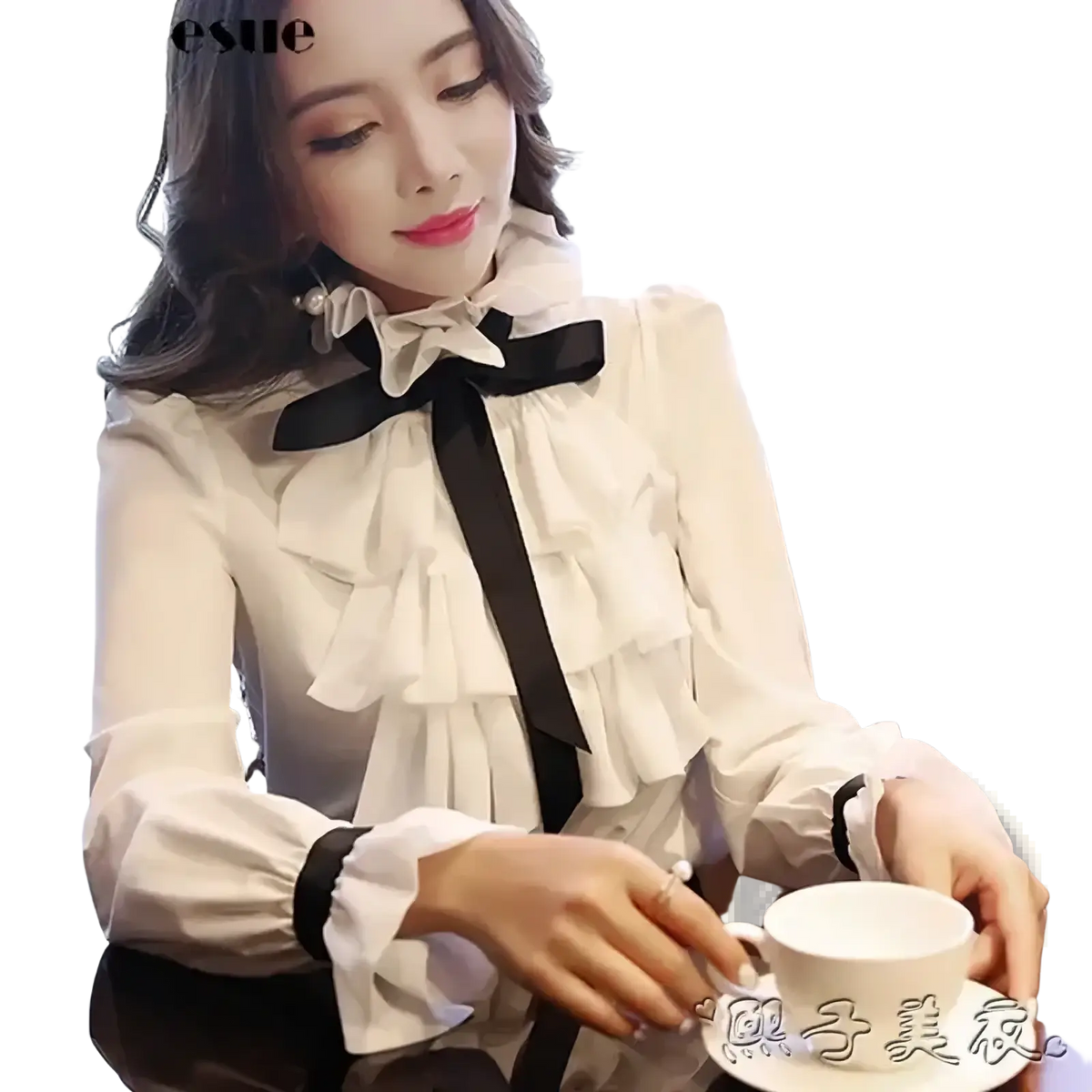 White ruffled bow long sleeve blouse with sheer black sleeves and a contrasting black ruffled bow tie