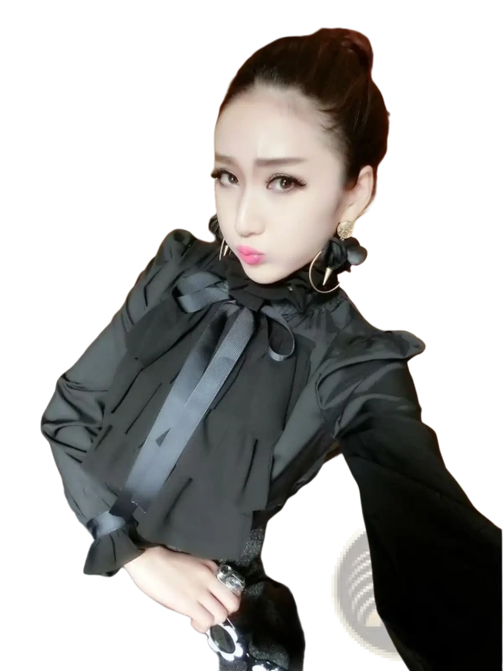Black long sleeve ruffled blouse with a prominent bow at the neckline made of lightweight fabric