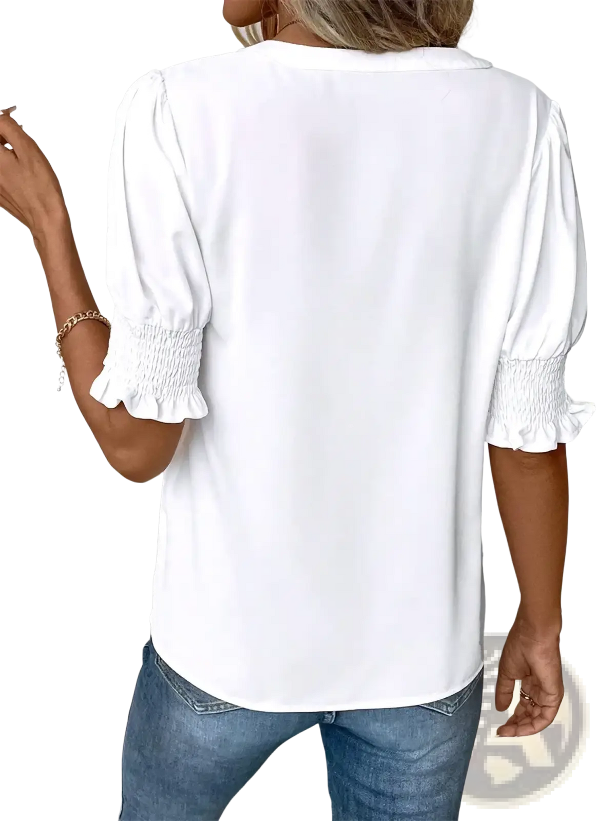 White short puff sleeve blouse with ruffled cuffs made of lightweight fabric for elegant casual wear