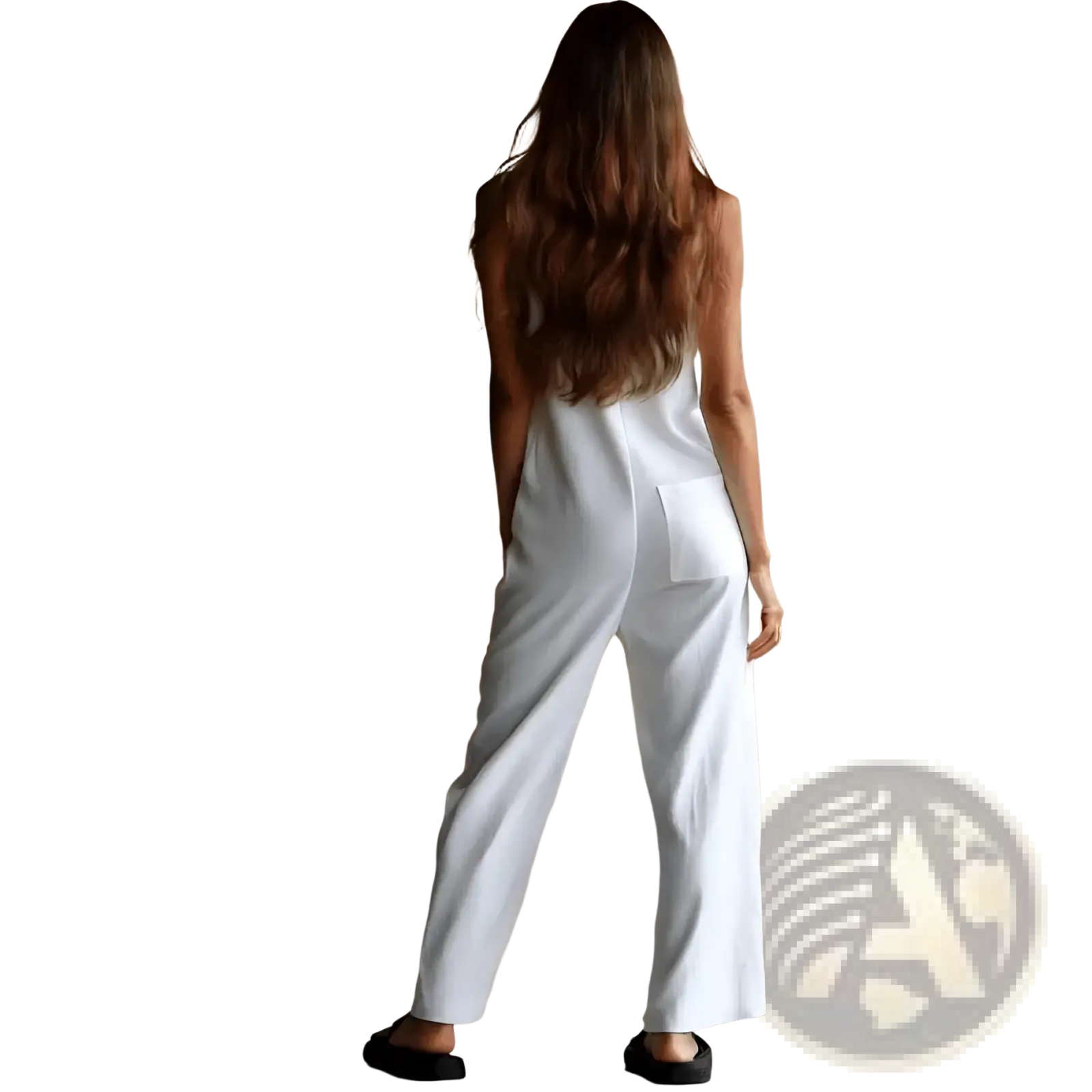 White sleeveless wide-leg jumpsuit in a sleek minimalist design with subtle side pockets, ideal for elegant occasions