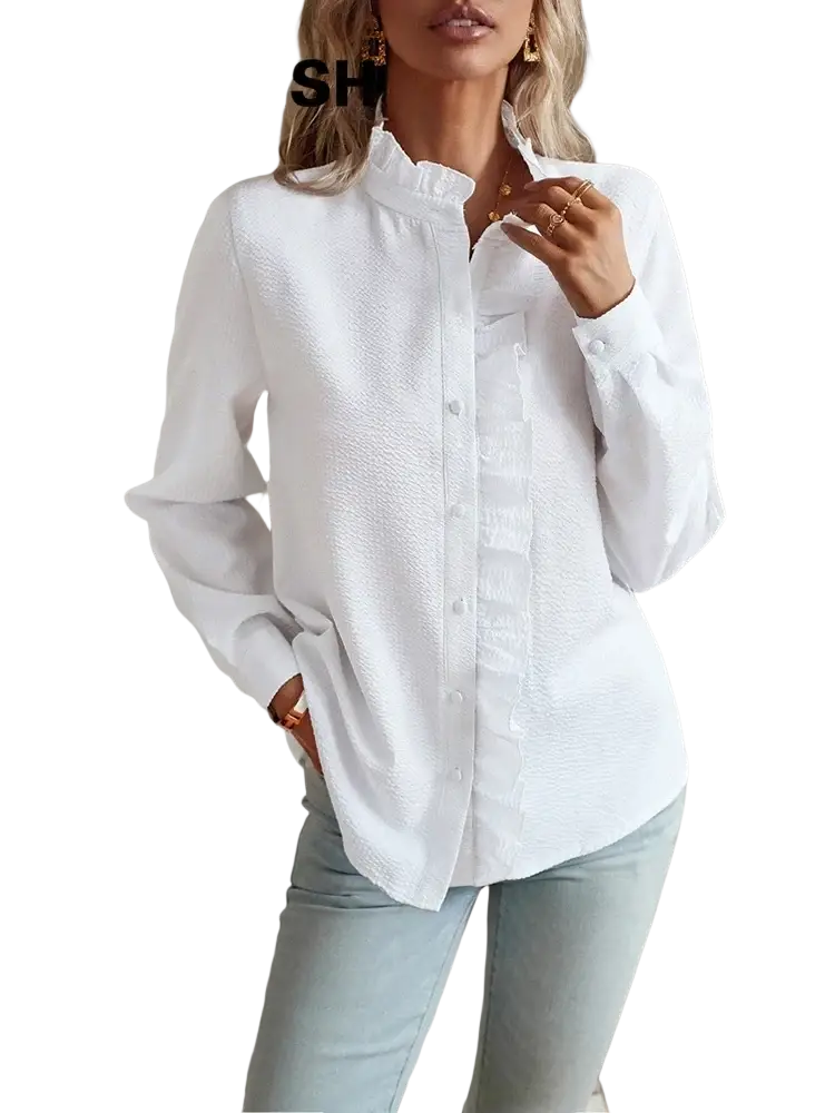 White textured long sleeve blouse with button-up front and ruffled detailing along the placket