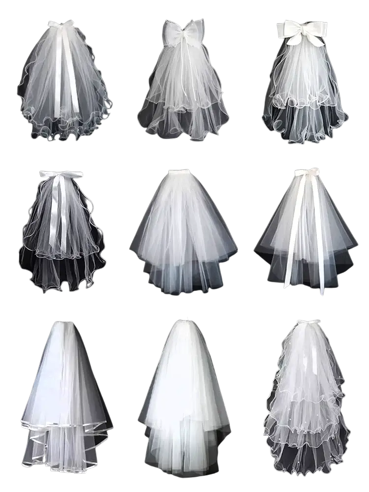 White tulle bow bridal veil featuring satin bows and layered ruffles in white tulle fabric for weddings