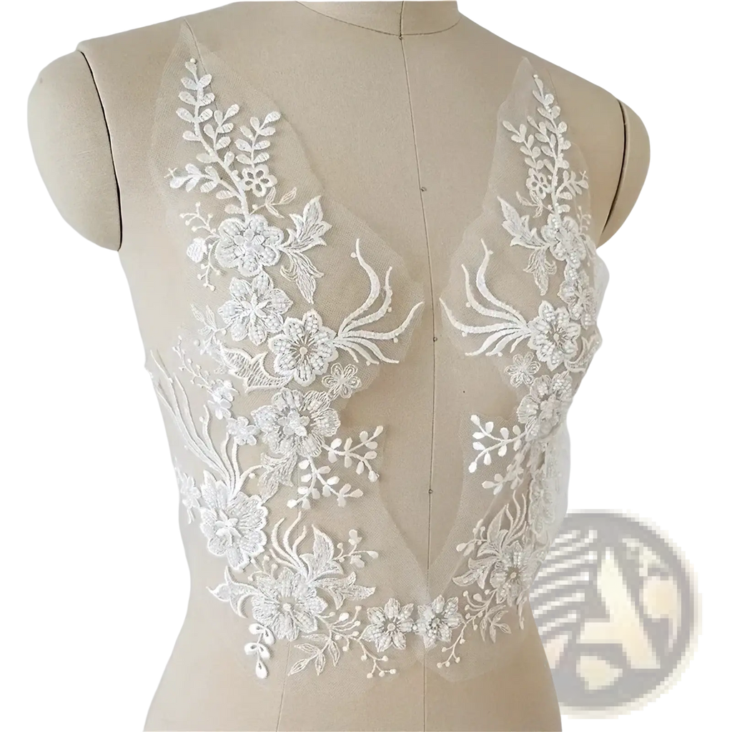White wedding dress lace applique pair featuring white floral lace with delicate embroidery and sheer mesh backing