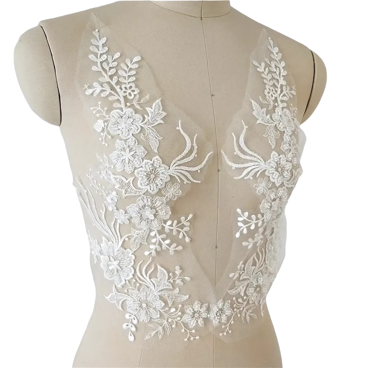 White wedding dress lace applique pair featuring white floral lace with delicate embroidery and sheer mesh backing