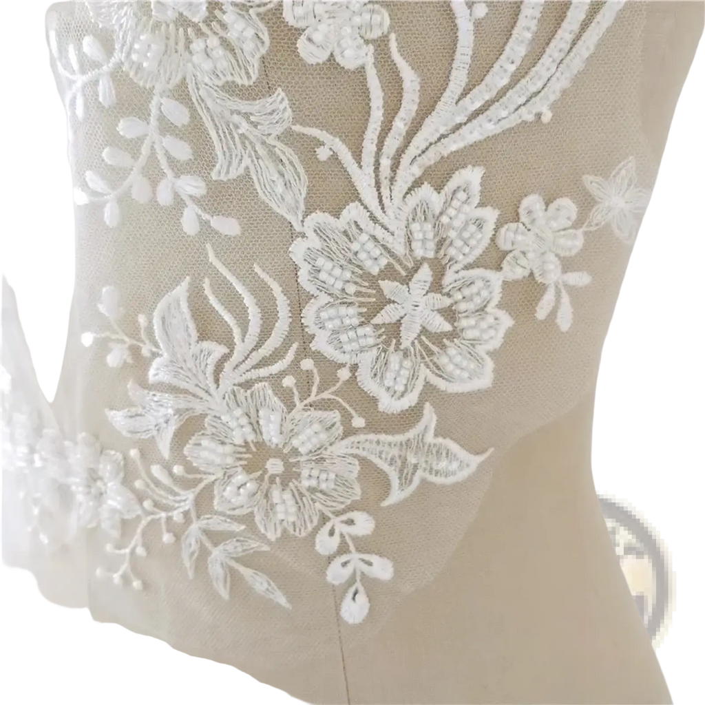 White wedding dress lace applique pair featuring white floral lace appliqué with delicate embroidery and beaded details