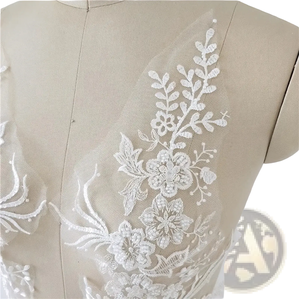 White wedding dress lace applique pair featuring white floral lace appliqué with delicate embroidery and beaded details