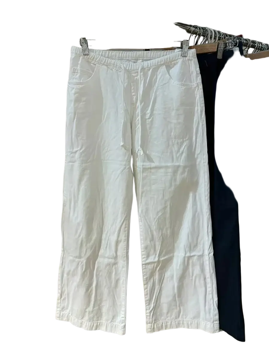 White wide leg denim pants in cotton with elastic waistband and front pockets for comfortable casual wear