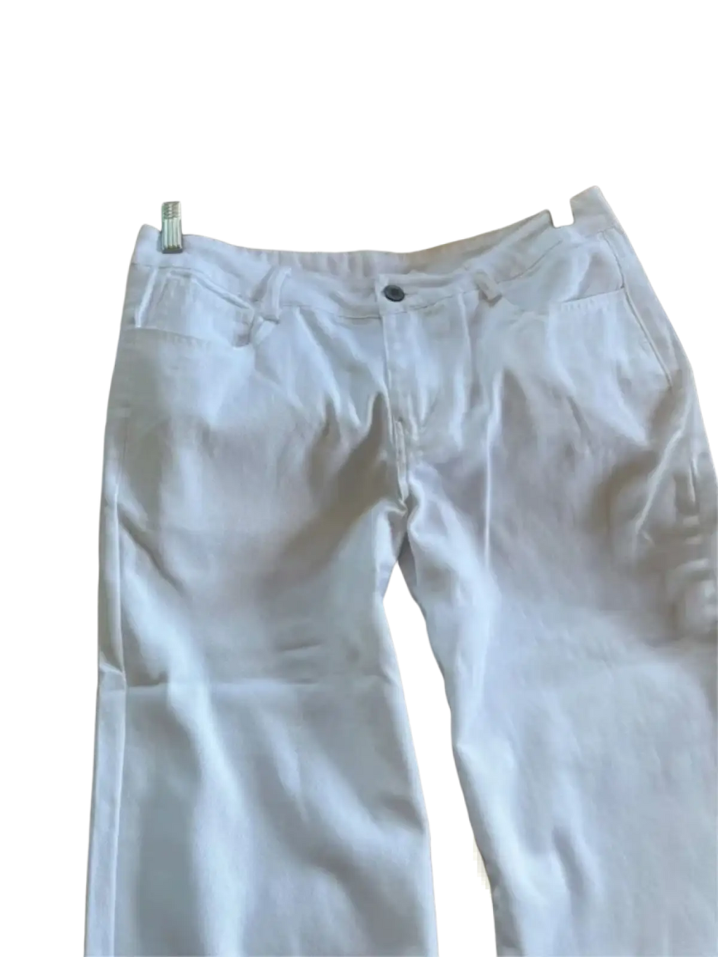 White wide leg denim pants made of white denim fabric hanging on a wooden hanger
