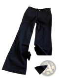Black jyate flared trousers with classic button closure and front pockets in white wide leg denim pants style