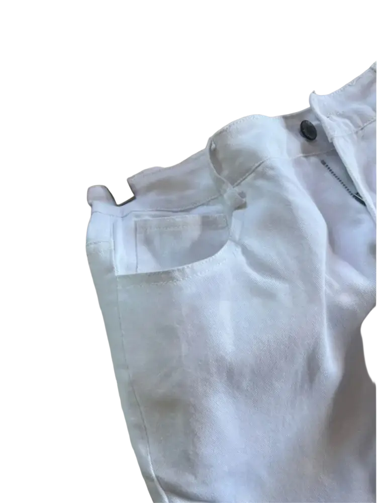 White denim shorts featuring a classic five-pocket design and button closure for casual wear