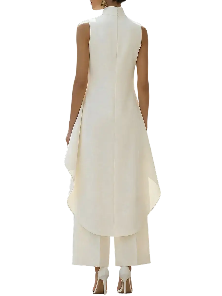 A sleek sleeveless white high neck dress with a flowing asymmetrical hemline and tailored fit for office wear