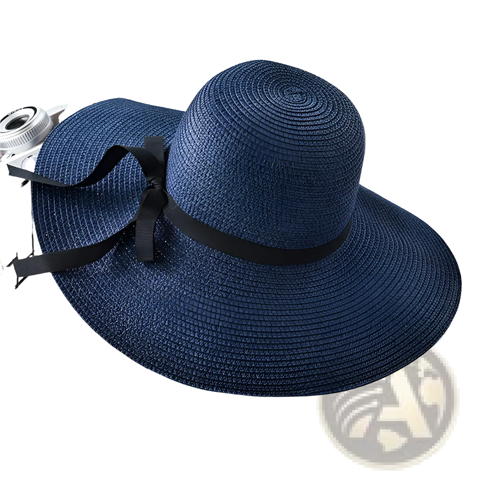 A navy blue wide brim straw sun hat with a black ribbon bow designed for sun protection and style