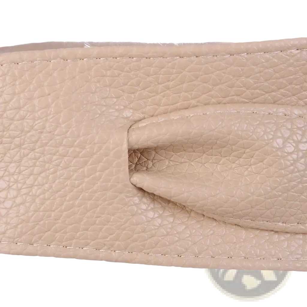 Beige wide leather bowknot wrap belt for women with textured leather strap featuring subtle pebbled finish and precise stitching