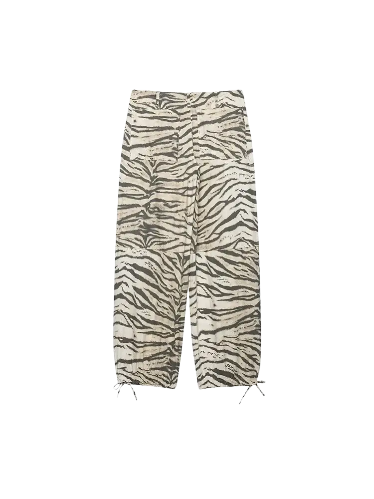 Beige and black zebra-striped wide leg cargo pants with drawstring cuffs for a stylish animal print look