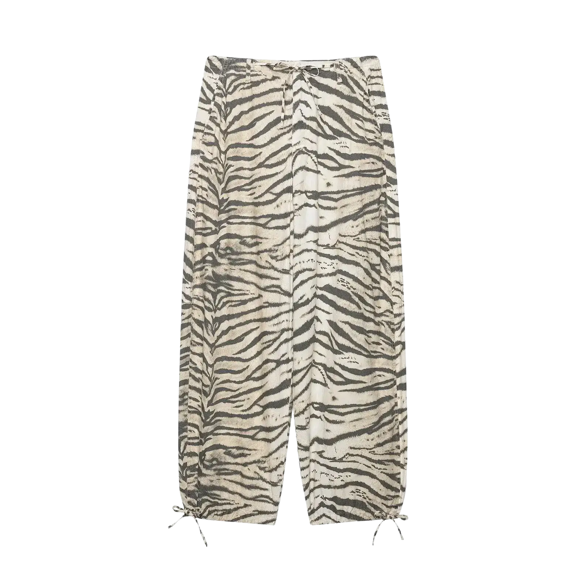 Wide leg cream-colored cargo pants with bold black zebra stripe pattern and drawstring cuffs