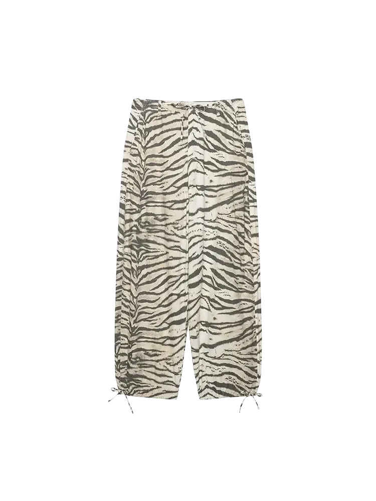 Wide leg tiger print cargo pants in off white with relaxed fit drawstring waist and cuffs for casual wear
