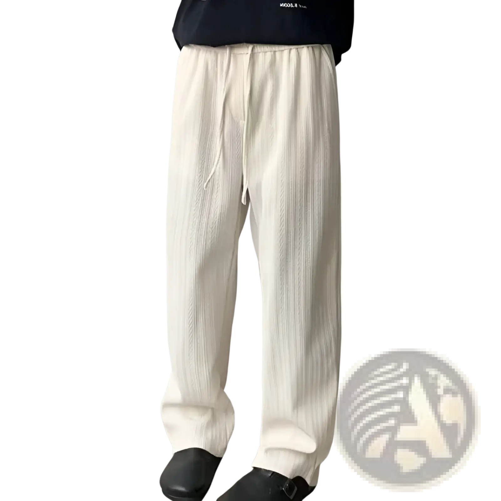 Cream-colored wide leg corduroy drawstring pants with ribbed knit texture and adjustable waistband for comfort