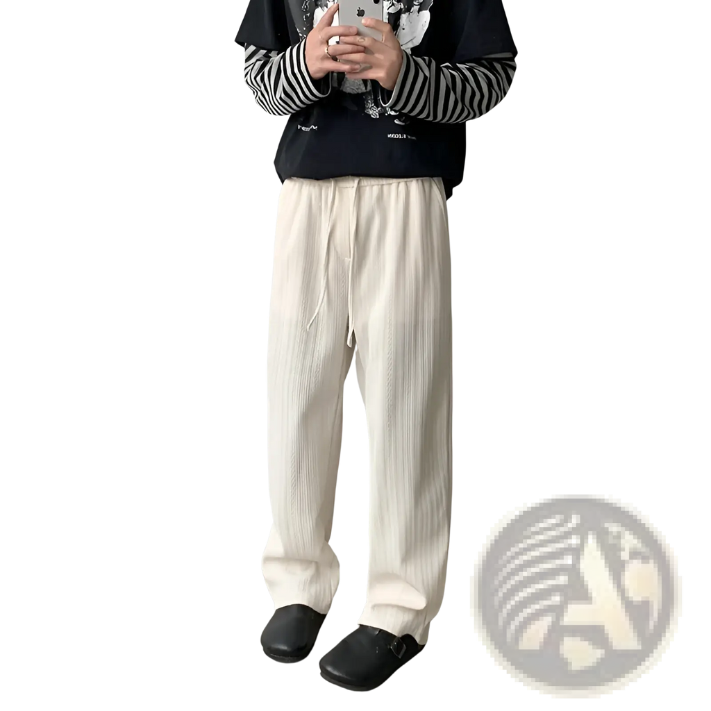 Wide leg corduroy drawstring pants in cream with ribbed knit texture and adjustable waist for comfortable fit