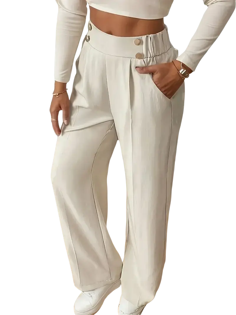 Cream-colored wide leg high waisted trousers with buttoned front and side pockets for a stylish look