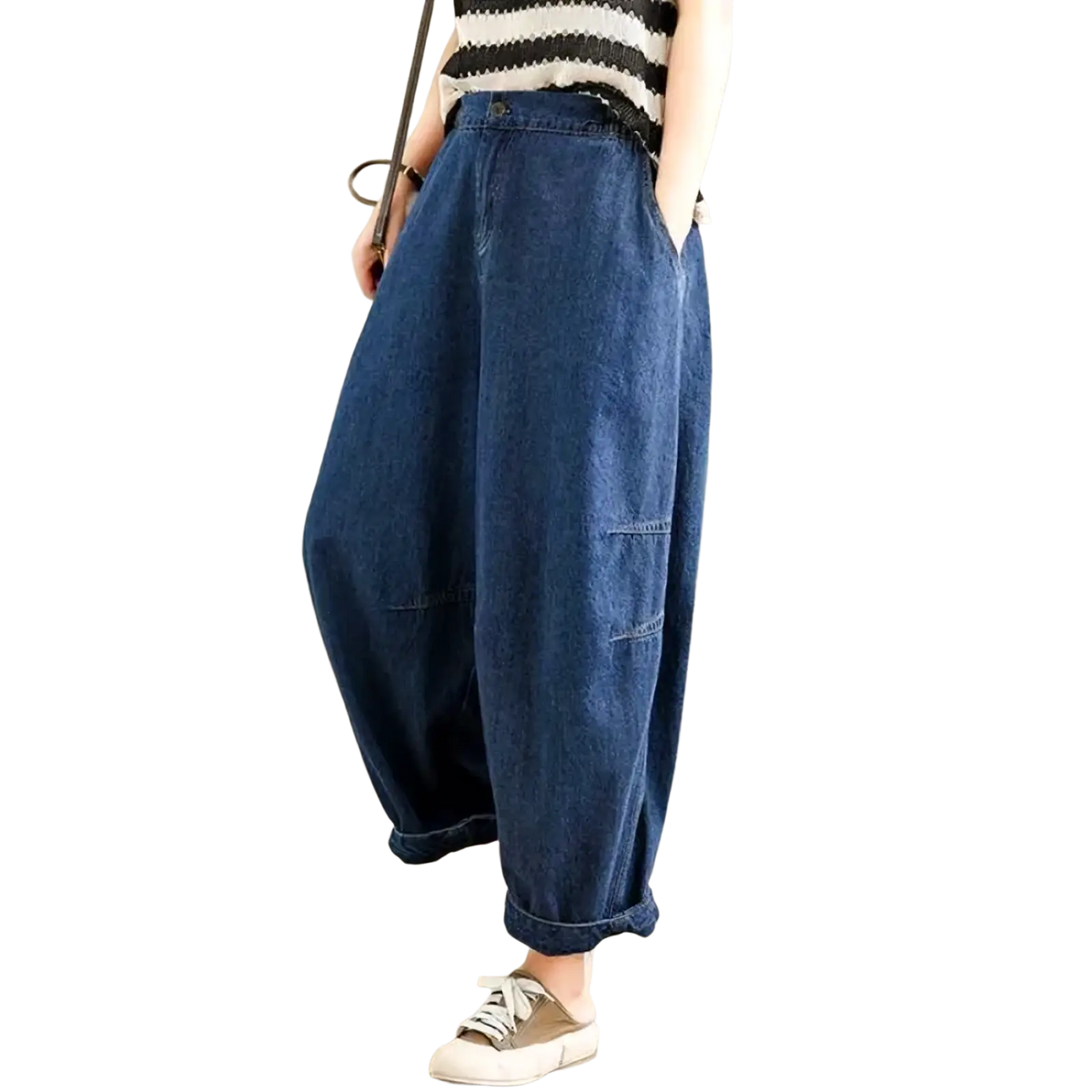 Blue denim wide leg harem pants for women featuring a loose fit and rolled cuffs for casual wear