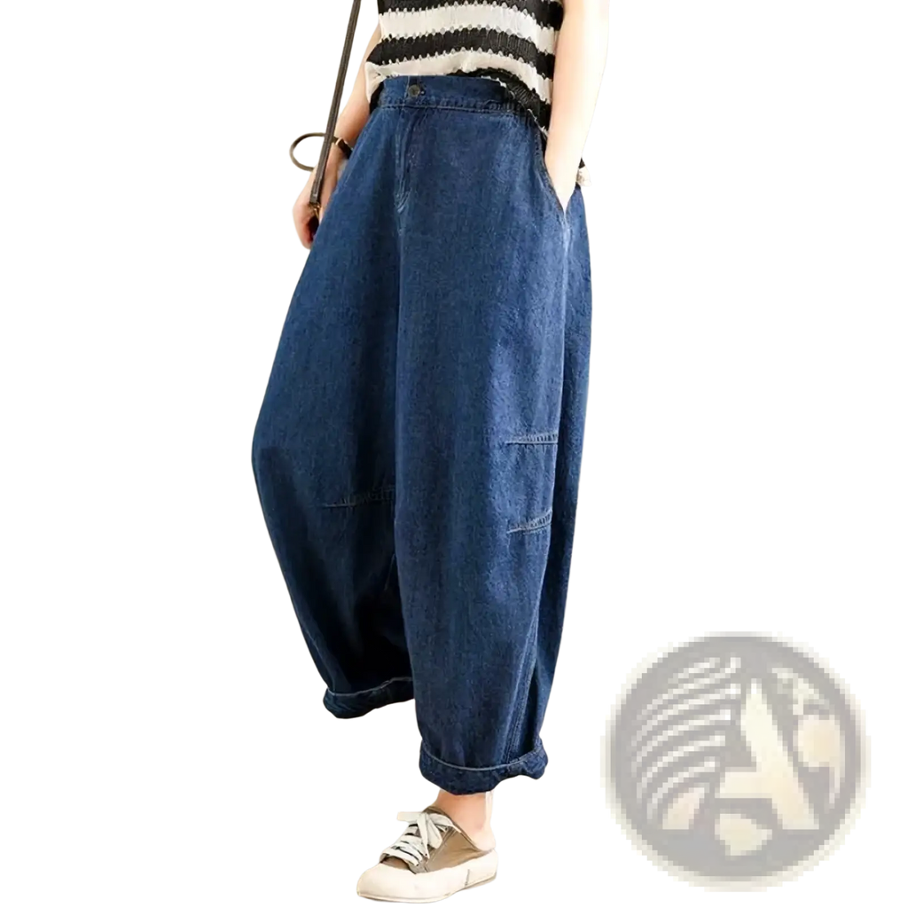 Blue denim wide leg harem pants for women featuring a loose fit and rolled cuffs for casual wear