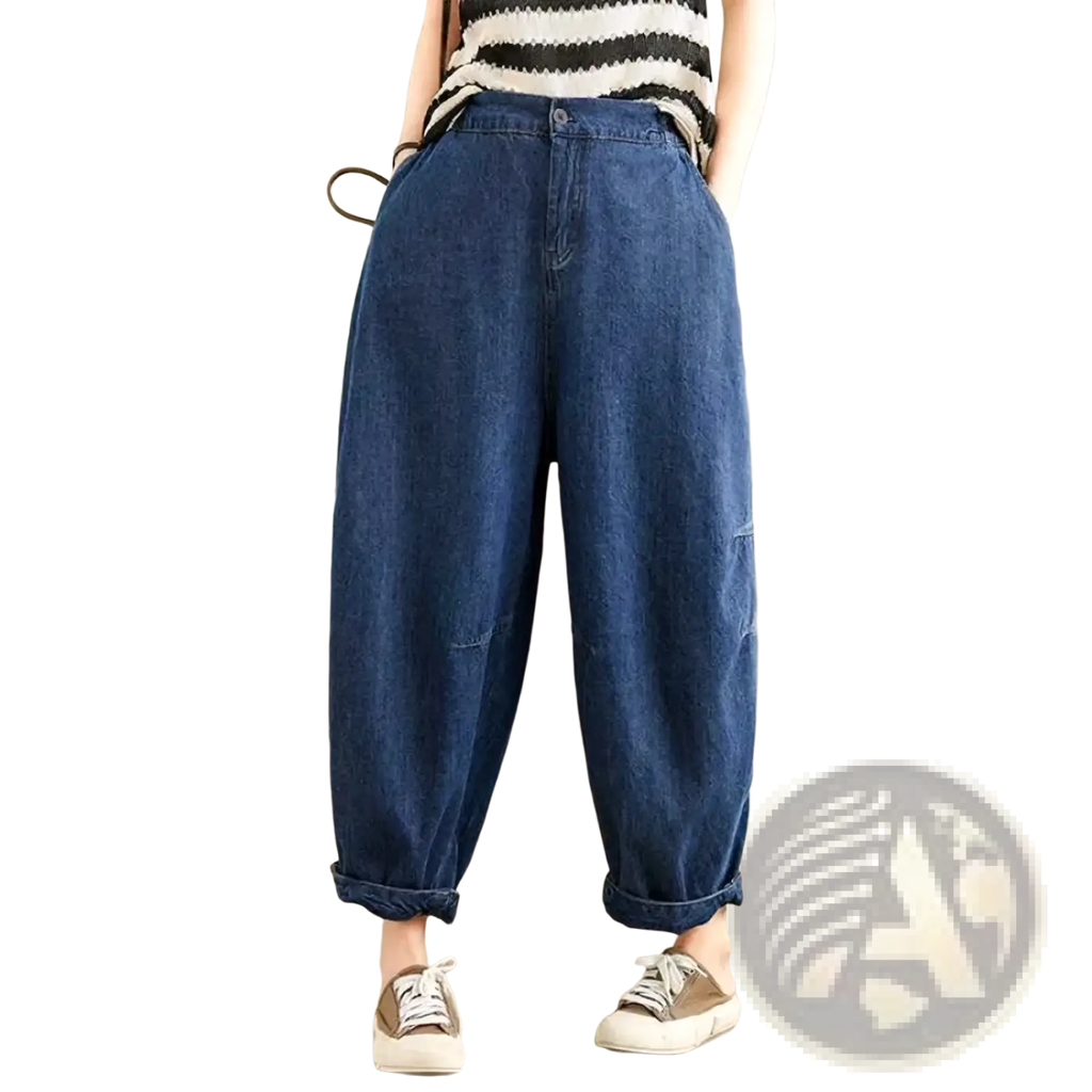 Wide leg denim harem pants for women in blue denim with a relaxed fit and rolled cuffs for casual wear