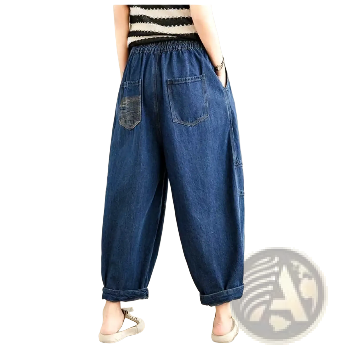 Blue denim wide leg denim harem pants for women featuring a relaxed fit and rolled cuffs casual jeans