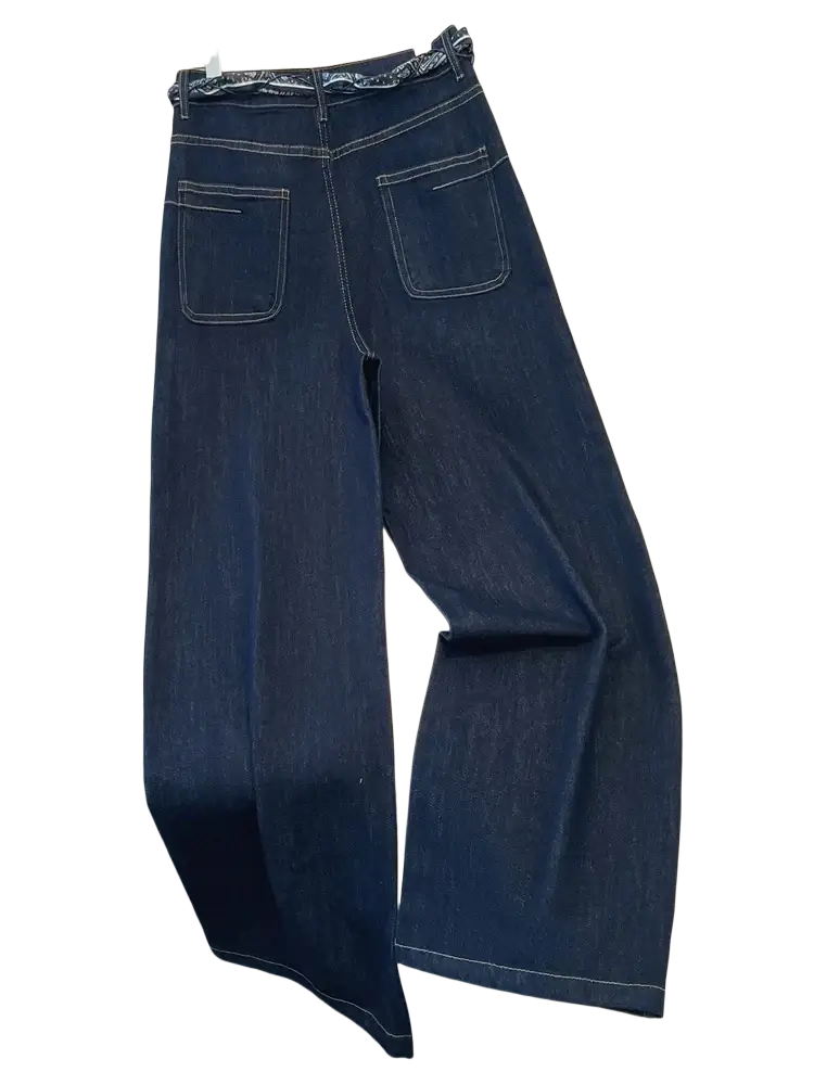 Wide leg denim jeans in dark indigo with wide-leg cut and contrasting white stitching with scarf belt detail