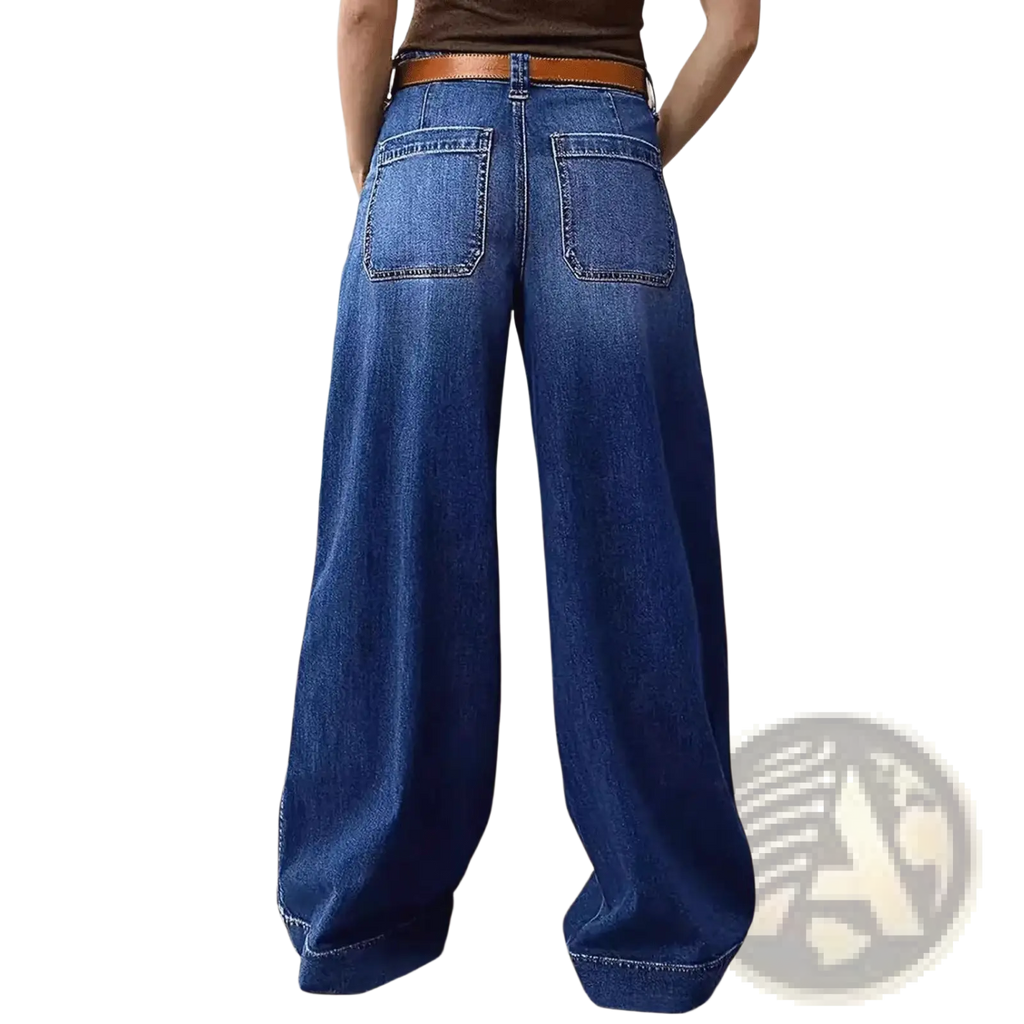 Wide leg denim pants in blue with a brown leather belt showcasing a stylish casual design