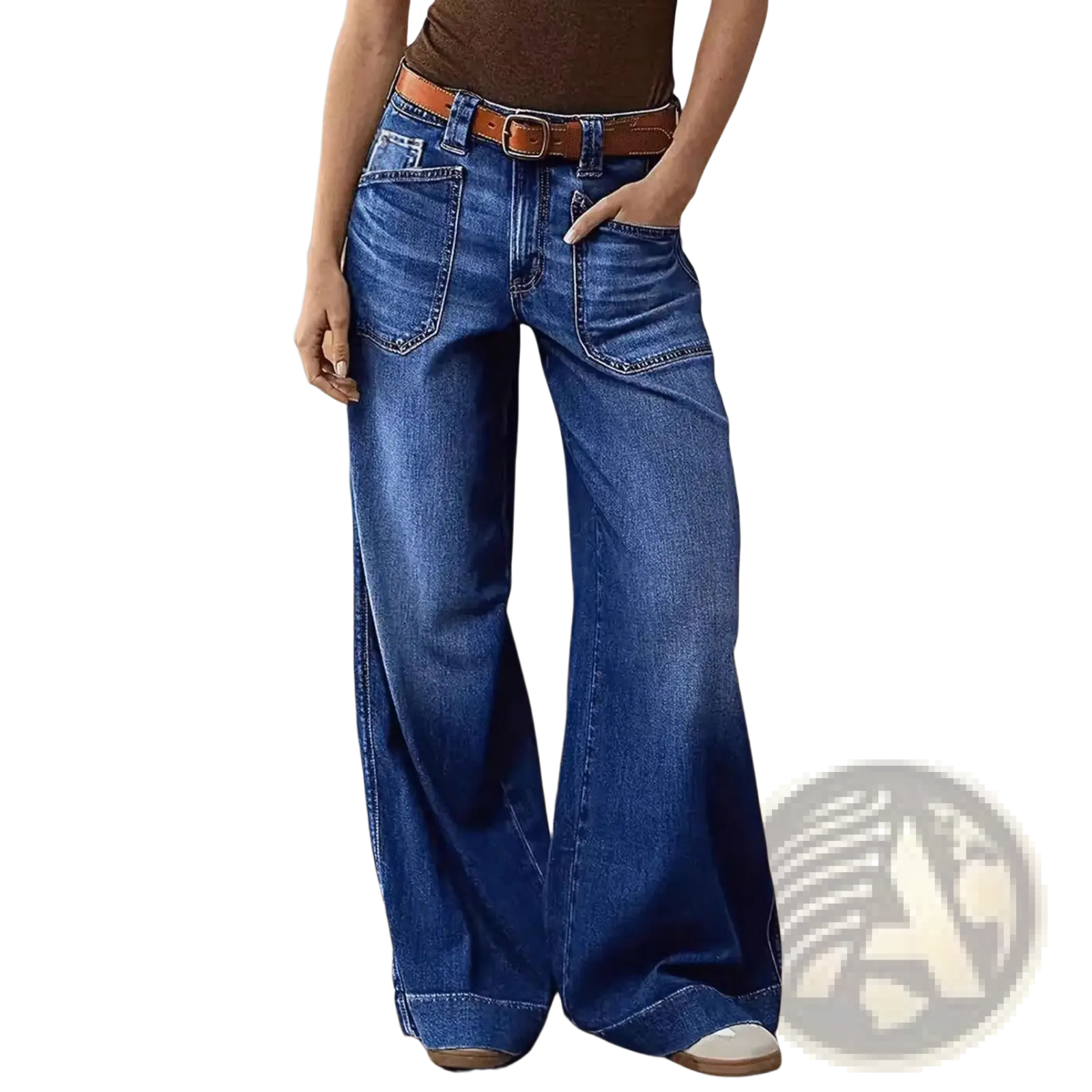Wide leg denim pants in blue with a brown leather belt made from high quality denim material