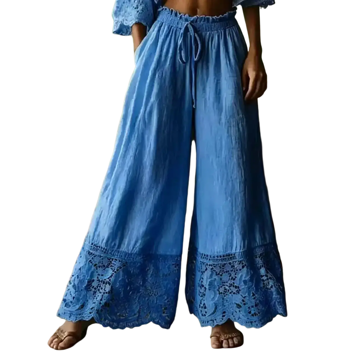 Blue wide leg linen pants with elastic waist and lace trim at the hem for comfortable stylish wear