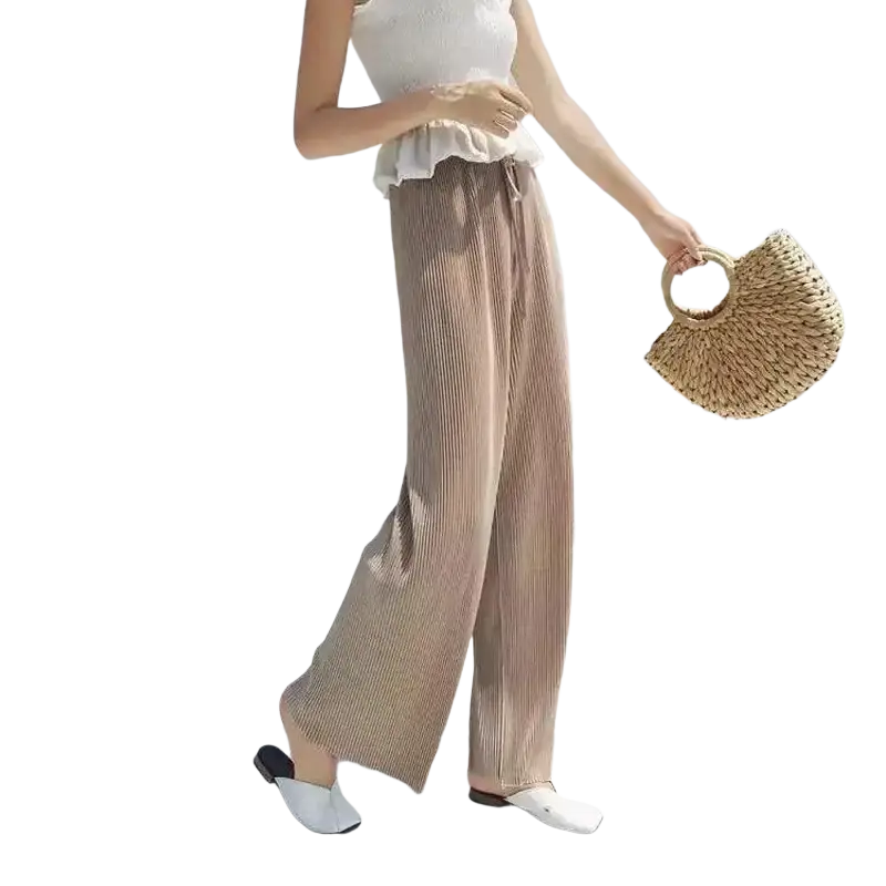 Beige wide leg summer pants for women with elastic waist and pleated design featuring a drawstring closure
