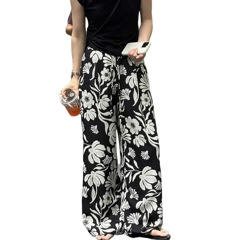 Black wide leg pants for women with bold white floral pattern featuring modname=ckeditor for stylish wear