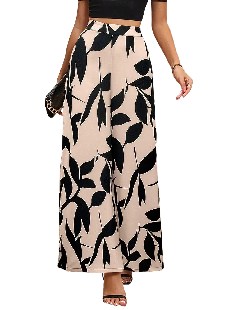Beige wide leg floral summer palazzo trousers with bold black leaf pattern ideal for warm weather wear