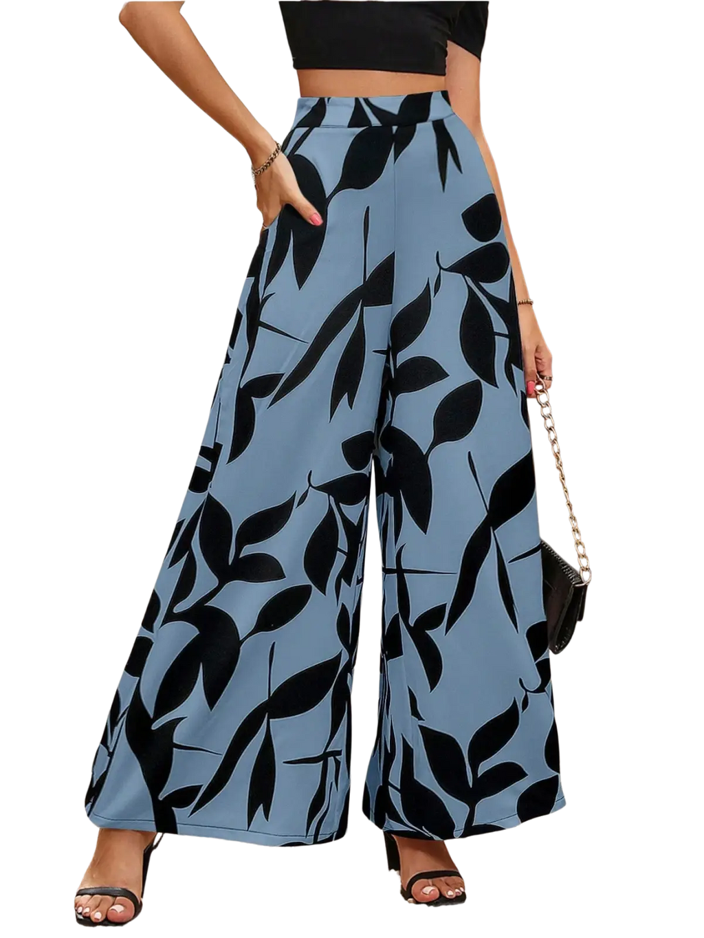 Light blue wide leg palazzo trousers with bold black leaf pattern ideal for summer casual wear