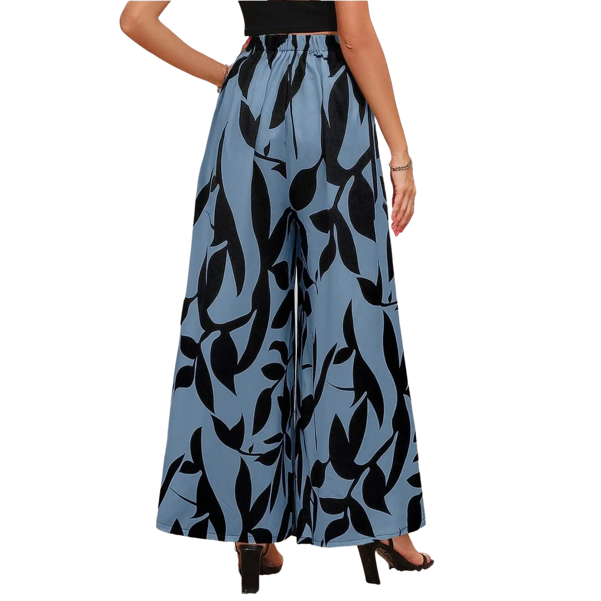 Light blue wide leg floral summer palazzo trousers with bold black leaf pattern for casual wear