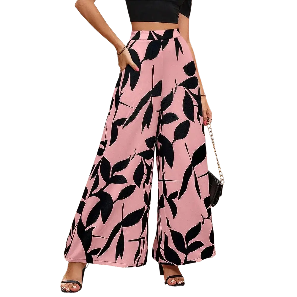 Pink wide leg floral summer palazzo trousers with bold black leaf pattern perfect for warm weather wear