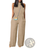 Beige textured fabric jumpsuit with high neckline and wide-leg design in a wide leg halter denim jumpsuit style