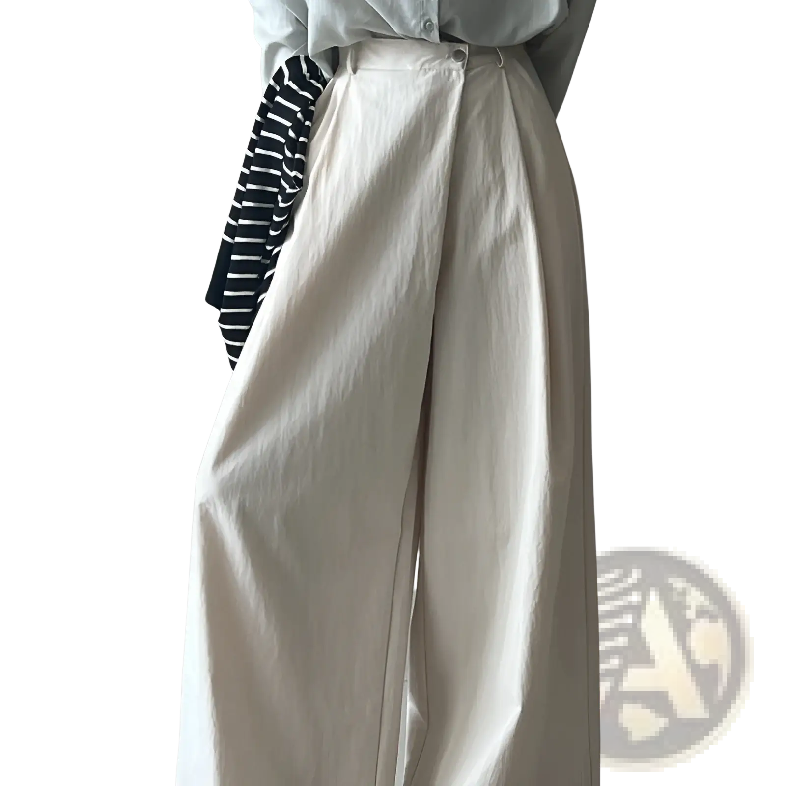 Cream-colored wide leg high waisted casual trousers with a relaxed flowing silhouette and soft fabric texture