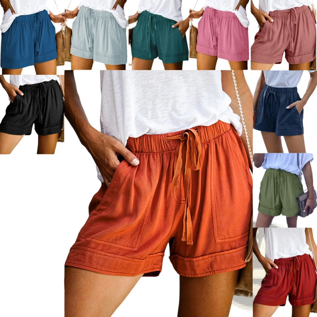 Wide leg high waisted orange drawstring shorts with relaxed fit rolled cuffs and pockets for casual wear