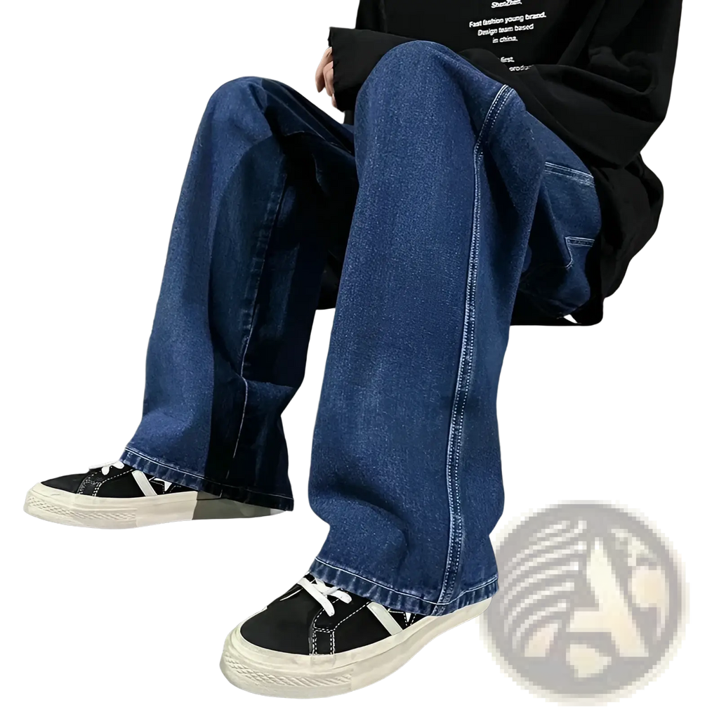 Dark blue wide leg denim jeans for men with visible stitching and a slightly faded wash in korean streetwear style