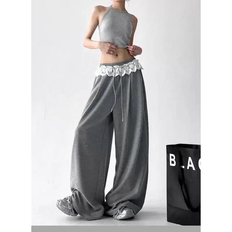 Gray wide-leg chiffon pants with white lace trim at the waistband featuring modname=ckeditor design details