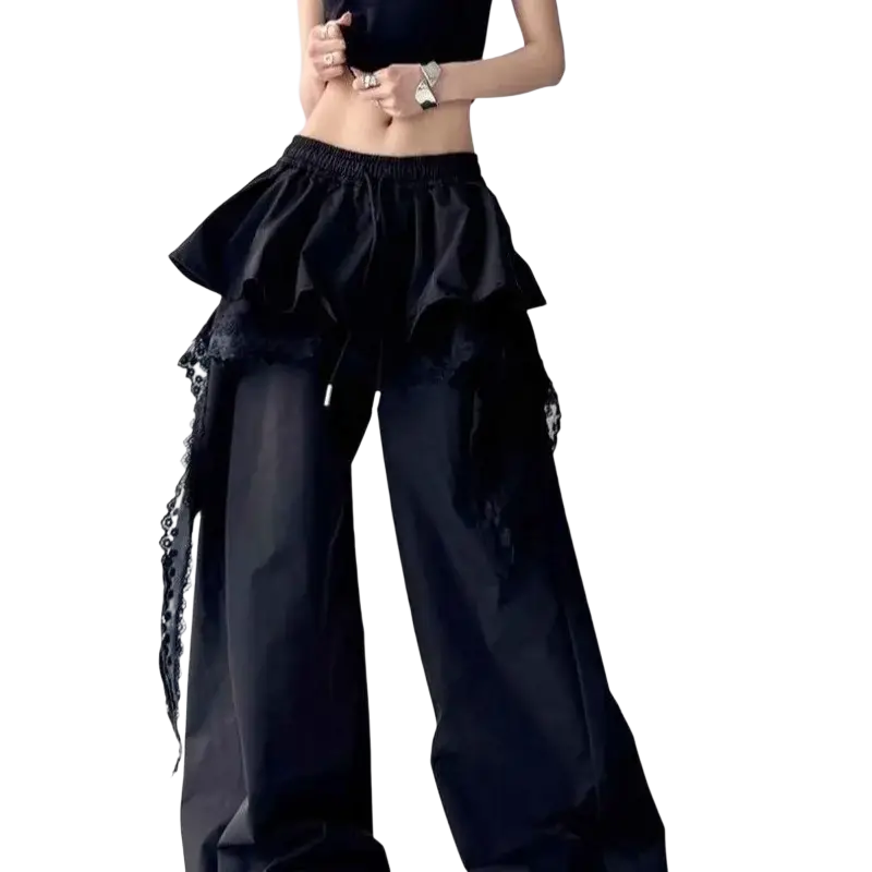 Black wide leg ruffled trousers with lace trim and drawstring waistband made from lightweight fabric