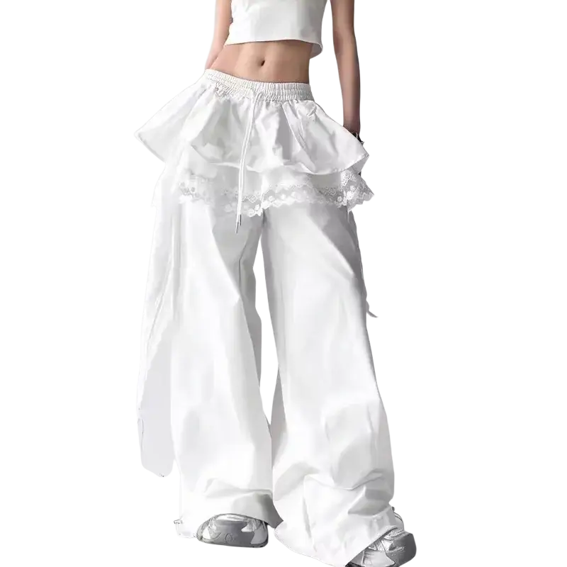 White wide leg ruffled trousers with lace trim detail at the waistband for elegant casual wear