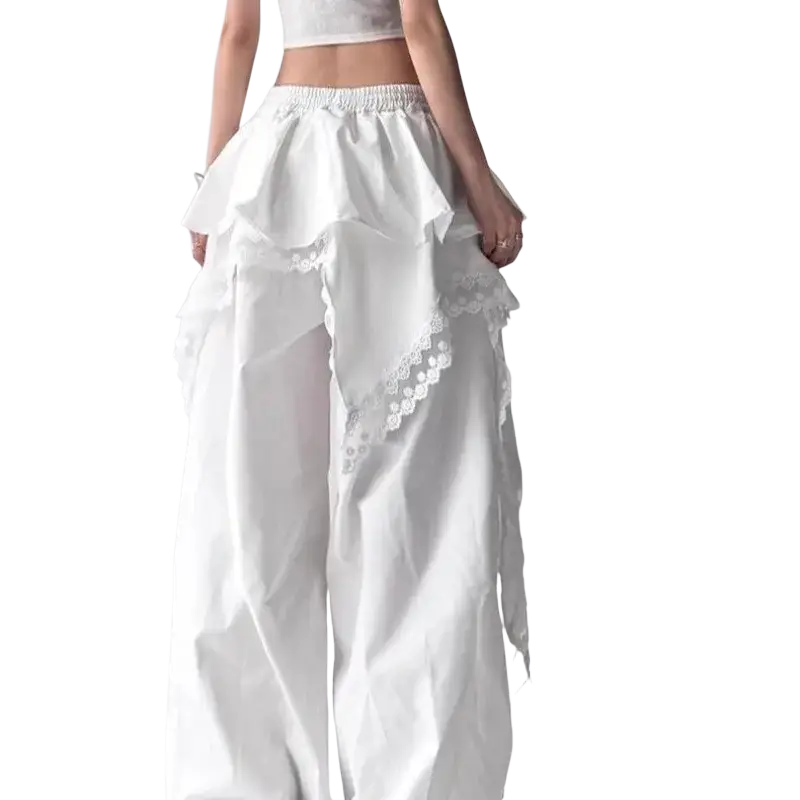 White wide leg ruffled trousers with lace trim and elastic waistband made from lightweight fabric