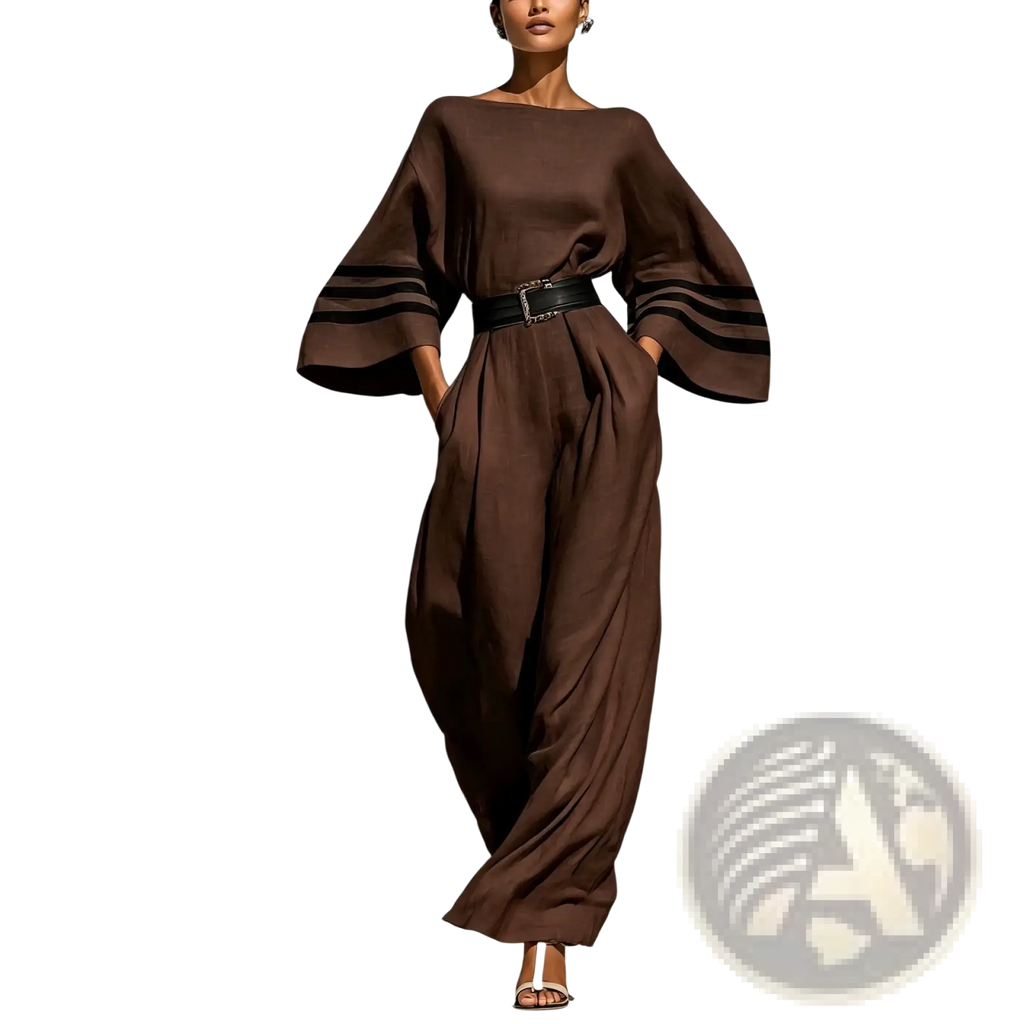 Brown satin wide-leg jumpsuit with black striped cuffs and matching belt highlighting elegant design