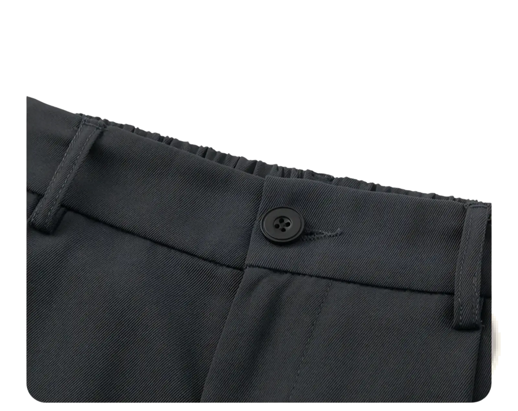 Wide leg mens suit trousers in black woven fabric with a loose fit and single black button at the waistband